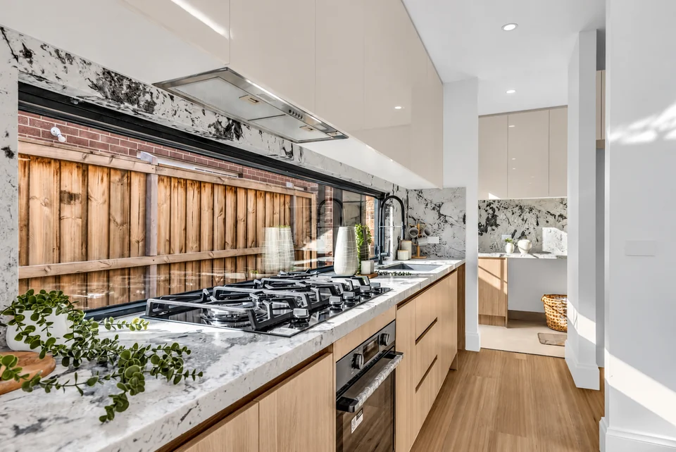 Warmth meets functionality — kitchens photograph from the supplied Stunning Build collection