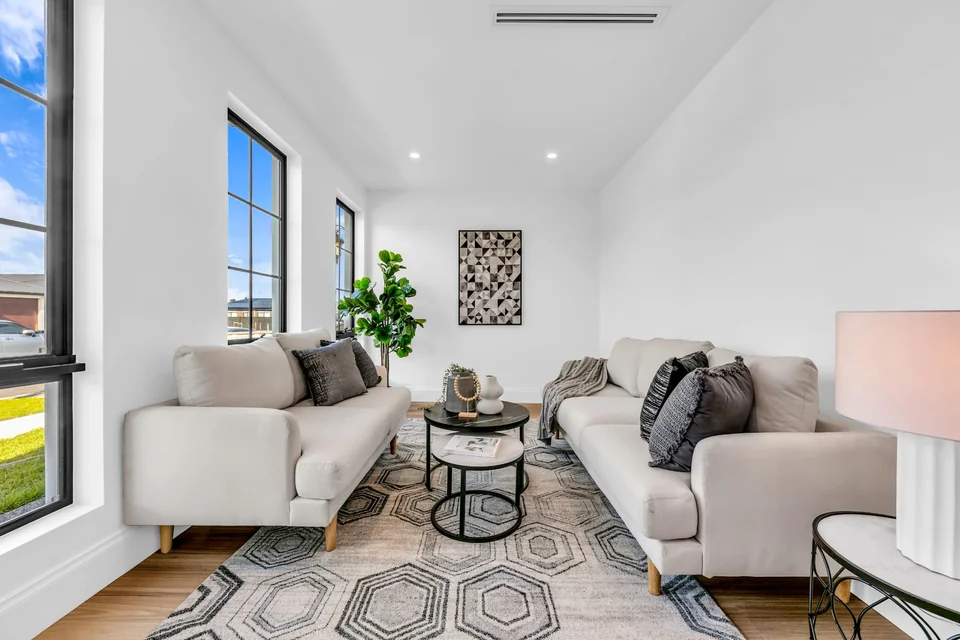 Fresh white interior walls in a sunlit living room