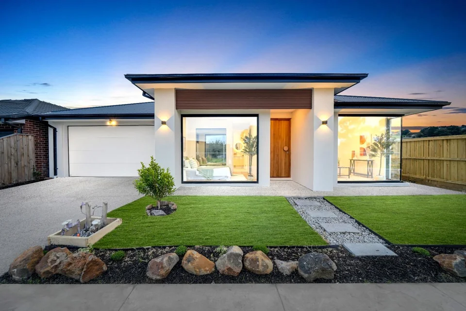 Contemporary single-storey home exterior at dusk